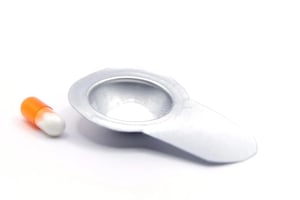 Capsule-and-blister-scaled